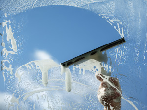 Using a Squeegee to Clean Window Film
